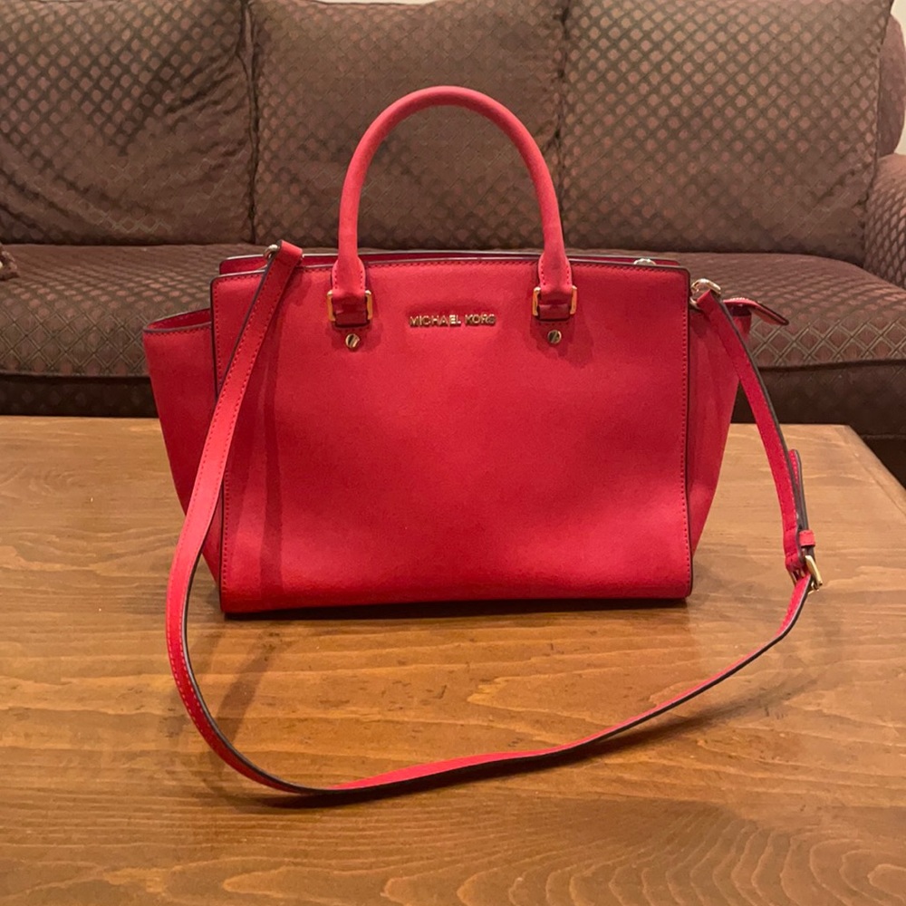Michael Kores poppy red bag